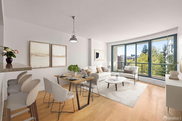 dining area featuring wood finished floors