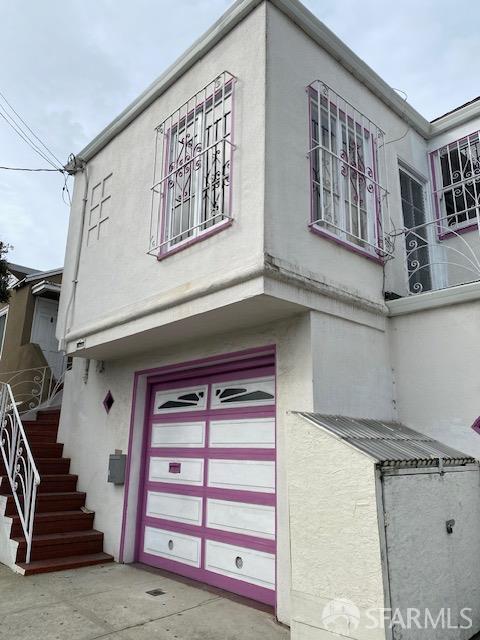 exterior space with a garage