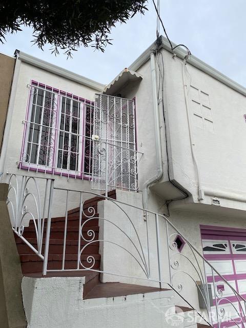 view of property exterior with a garage