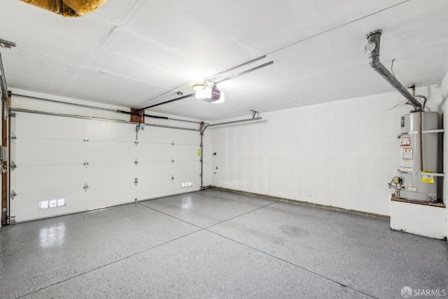 garage with secured water heater and a garage door opener