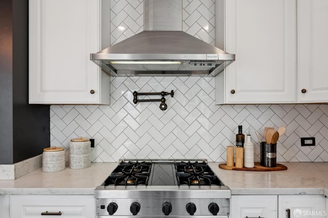 20 Rossmoor Dr, San Francisco, CA 94132 - kitchen featuring wall chimney range hood, decorative backsplash, range, white cabinets, and light stone countertops