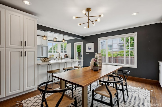 20 Rossmoor Dr, San Francisco, CA 94132 - dining space with crown molding, dark wood-style floors, a chandelier, baseboards, and recessed lighting