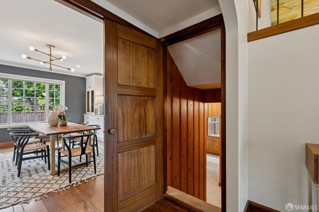 20 Rossmoor Dr, San Francisco, CA 94132 - corridor with wood-type flooring and a chandelier