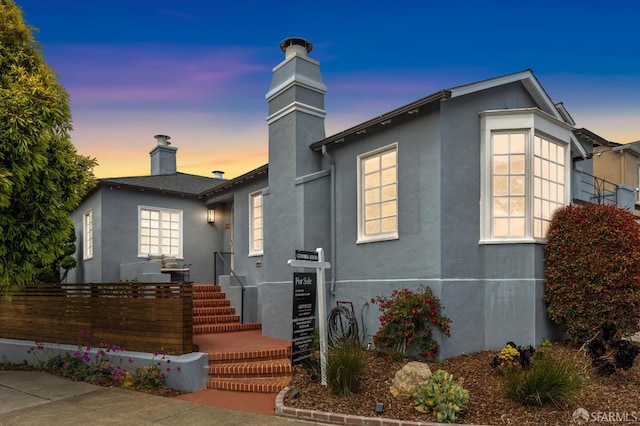 20 Rossmoor Dr, San Francisco, CA 94132 - view of front of home featuring a chimney and stucco siding
