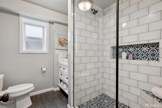 20 Rossmoor Dr, San Francisco, CA 94132 - full bath with a tile shower, toilet, wood finished floors, and baseboards