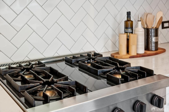 20 Rossmoor Dr, San Francisco, CA 94132 - kitchen view of stovetop with downdraft and tasteful backsplash