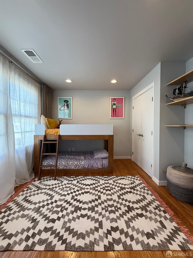 2543 44th Ave, San Francisco, CA 94116 - bedroom featuring wood finished floors, baseboards, and recessed lighting