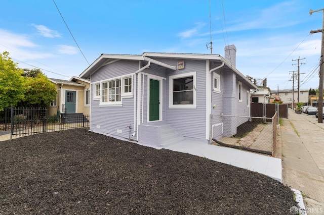 3644 Redding St, Oakland, CA 94619 - view of property exterior with a chimney