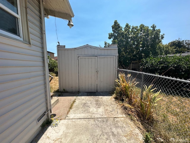 exterior space featuring a storage shed