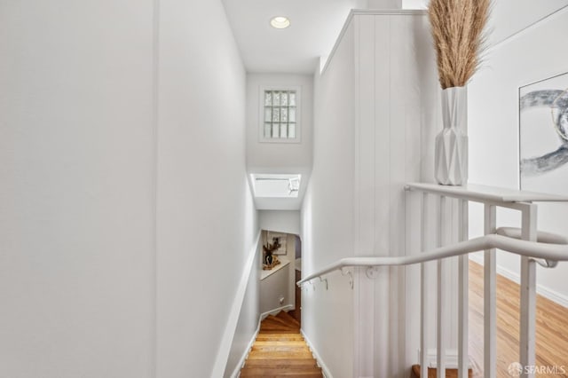 25 Roselyn Ter, San Francisco, CA 94118 - staircase featuring wood finished floors, recessed lighting, and baseboards