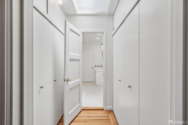 25 Roselyn Ter, San Francisco, CA 94118 - corridor featuring light wood-type flooring