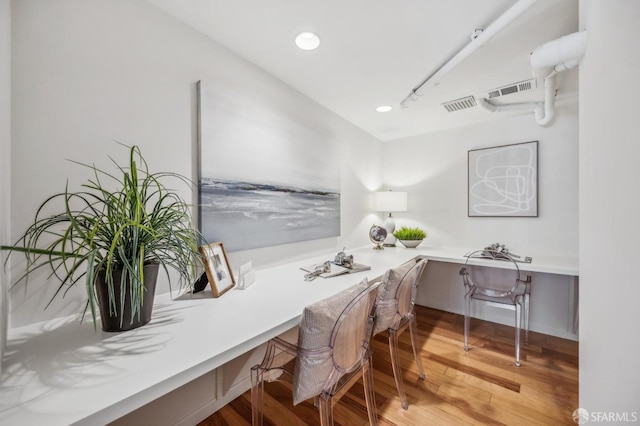 25 Roselyn Ter, San Francisco, CA 94118 - office space with built in study area, light wood-type flooring, and recessed lighting