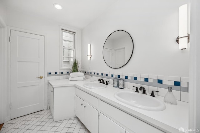 25 Roselyn Ter, San Francisco, CA 94118 - bathroom with tile patterned floors, double vanity, and tasteful backsplash