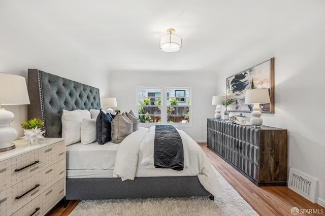25 Roselyn Ter, San Francisco, CA 94118 - bedroom with wood finished floors and baseboards