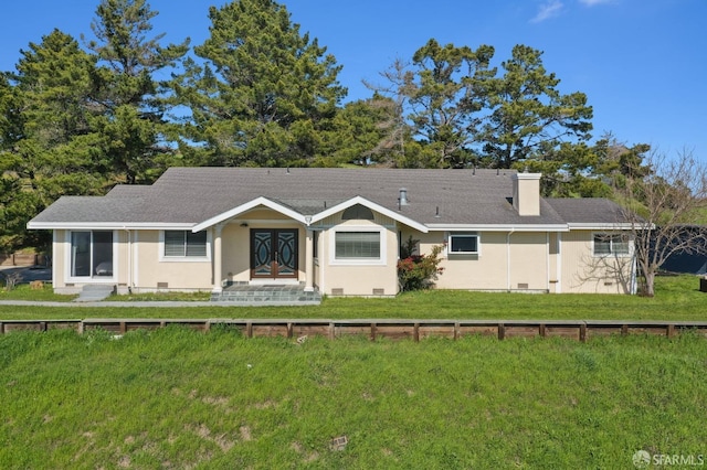 ranch-style house with a shingled roof, a front yard, crawl space, and a chimney