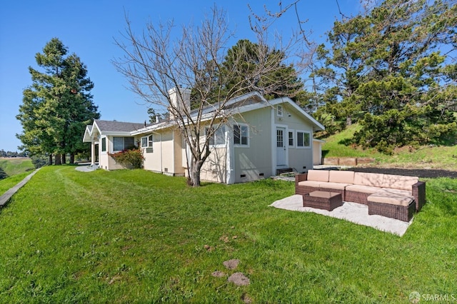 exterior space featuring outdoor lounge area and a patio area