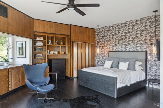 bedroom featuring dark wood-style flooring and visible vents