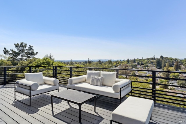 wooden terrace featuring outdoor lounge area