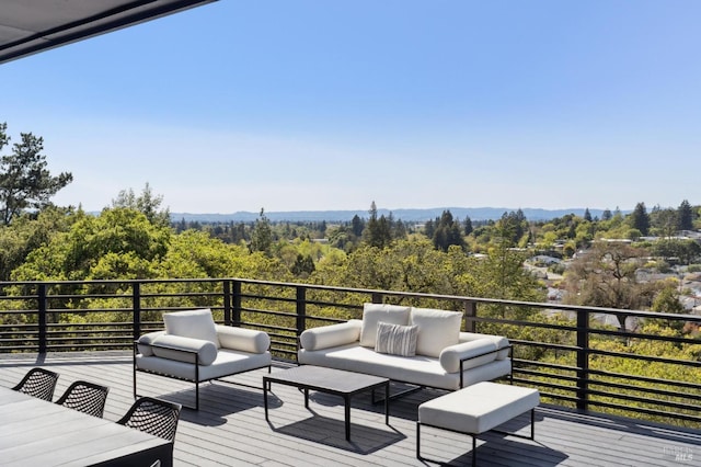deck with an outdoor hangout area