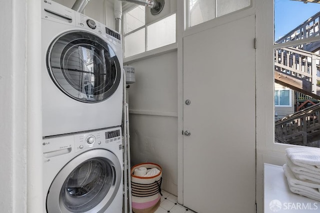 813 Union St, San Francisco, CA 94133 - washroom featuring stacked washer / drying machine and plenty of natural light