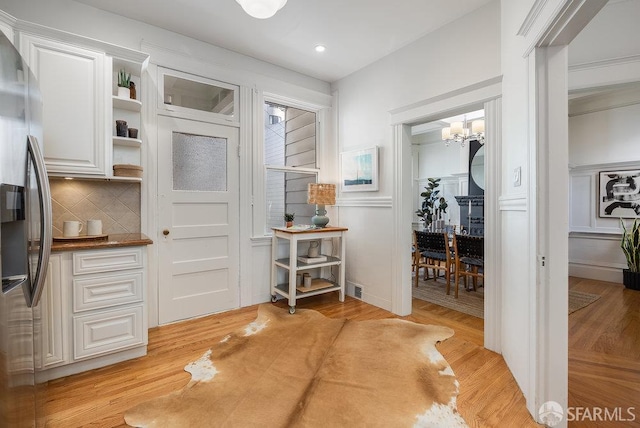 813 Union St, San Francisco, CA 94133 - entryway featuring a chandelier, recessed lighting, and light wood-style flooring