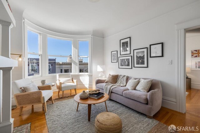 813 Union St, San Francisco, CA 94133 - living room featuring wood finished floors and ornate columns
