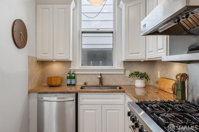 813 Union St, San Francisco, CA 94133 - kitchen featuring stainless steel dishwasher, extractor fan, white cabinets, and tasteful backsplash