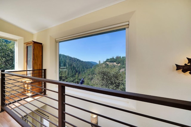 balcony featuring a mountain view