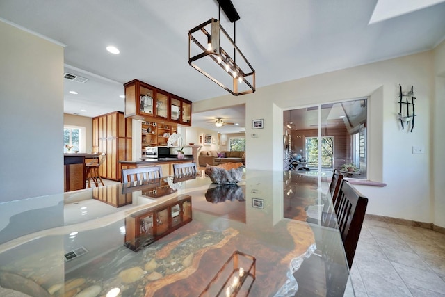 dining room with a ceiling fan, visible vents, recessed lighting, and light tile patterned floors