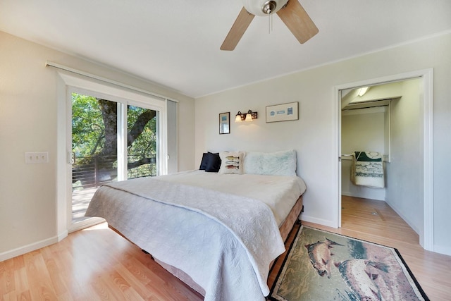 bedroom with baseboards, wood finished floors, access to outside, and ceiling fan