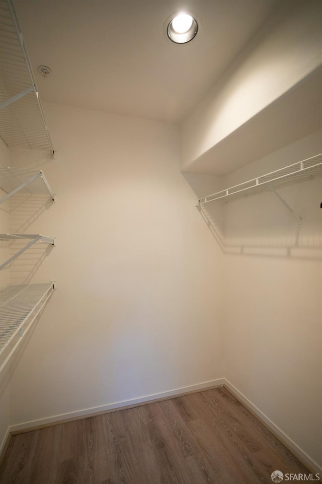 981 Asilomar Ter Unit 1, Sunnyvale, CA 94086 - spacious closet featuring wood finished floors
