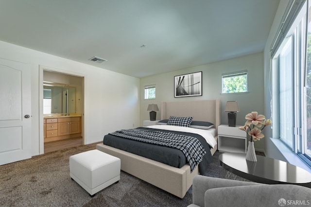 981 Asilomar Ter Unit 1, Sunnyvale, CA 94086 - bedroom with multiple windows, carpet floors, and ensuite bath