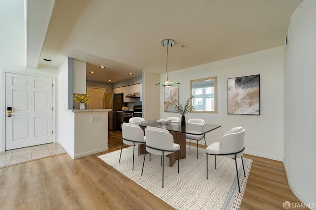 981 Asilomar Ter Unit 1, Sunnyvale, CA 94086 - dining space featuring light wood-style flooring