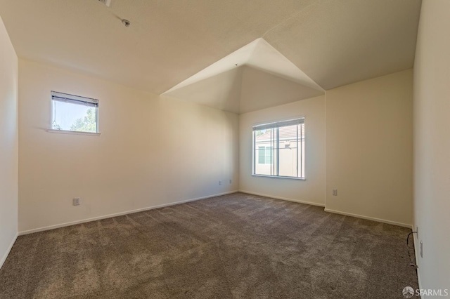 981 Asilomar Ter Unit 1, Sunnyvale, CA 94086 - empty room featuring dark carpet and vaulted ceiling