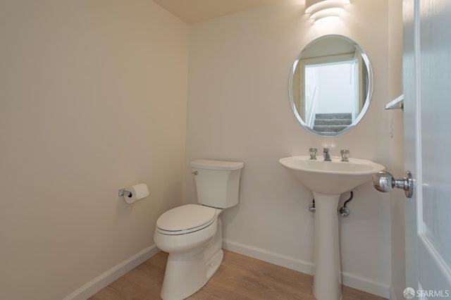 981 Asilomar Ter Unit 1, Sunnyvale, CA 94086 - bathroom featuring toilet and wood finished floors
