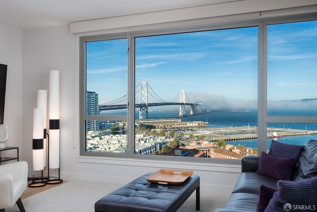 living room featuring a water view