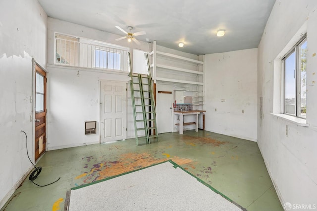 80 Bronte St, San Francisco, CA 94110 - empty room featuring concrete flooring, a ceiling fan, and heating unit