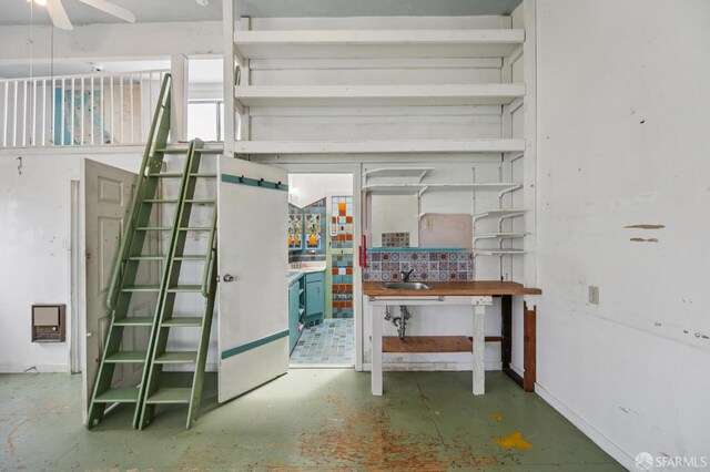 80 Bronte St, San Francisco, CA 94110 - detailed view of concrete flooring and ceiling fan