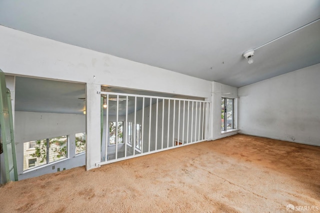 80 Bronte St, San Francisco, CA 94110 - empty room with carpet flooring and lofted ceiling