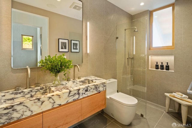 full bathroom with vanity, toilet, tile patterned floors, recessed lighting, and tiled shower