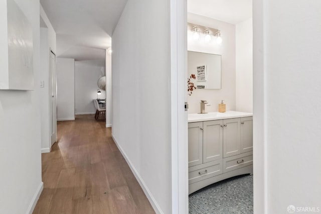 1520 Taylor St Unit 103, San Francisco, CA 94133 - hallway featuring a sink and wood finished floors