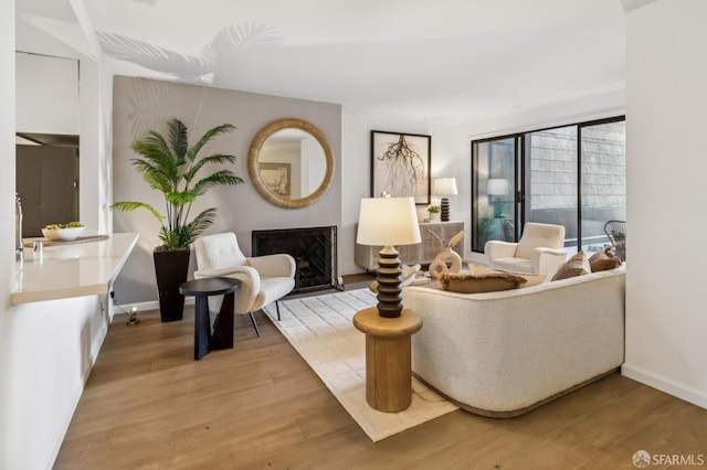 1520 Taylor St Unit 103, San Francisco, CA 94133 - living room with wood finished floors and a fireplace