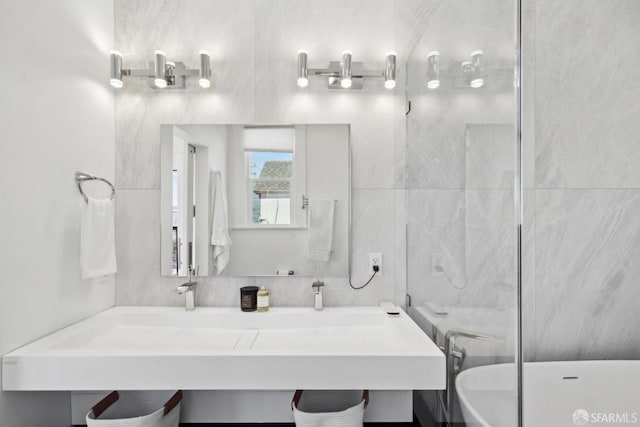 bathroom featuring a freestanding tub