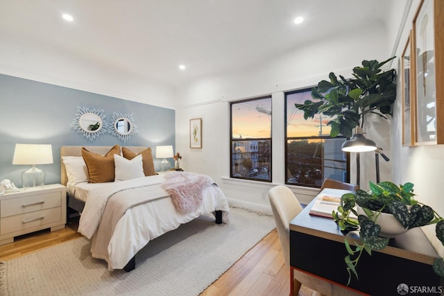 bedroom featuring recessed lighting and light wood finished floors