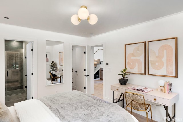 bedroom with hardwood / wood-style flooring