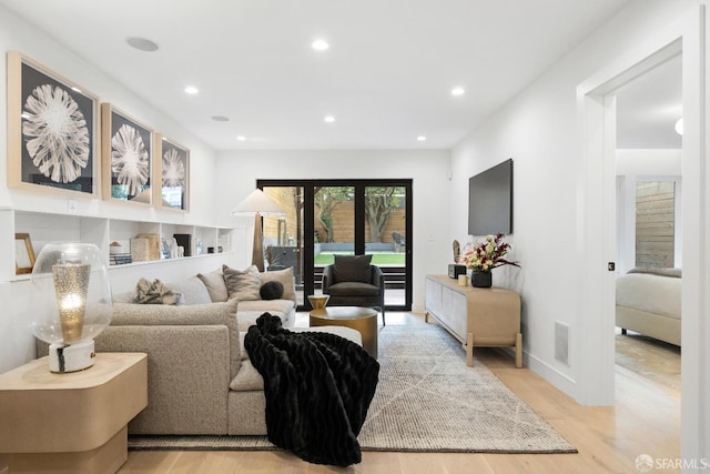 living room featuring light hardwood / wood-style floors