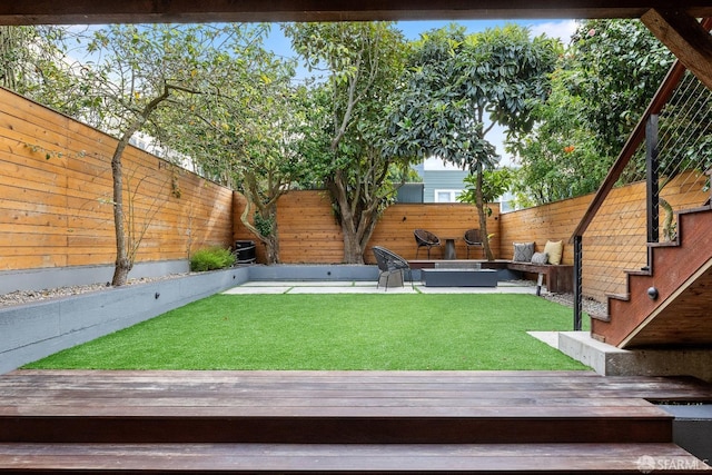 view of yard featuring an outdoor hangout area and a deck