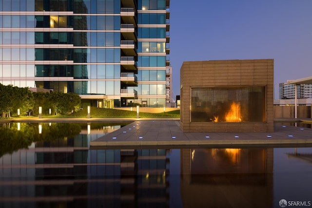 view of property at dusk