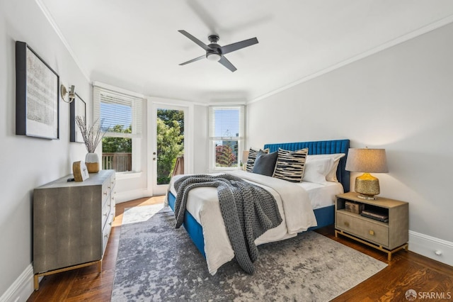 bedroom featuring crown molding, access to outside, baseboards, and multiple windows