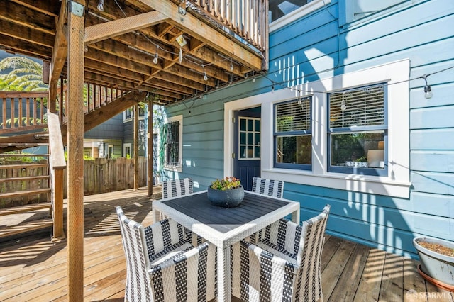 deck with outdoor dining space
